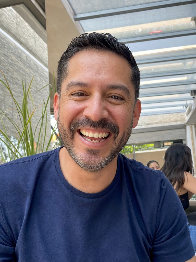 Man laughing in the sunshine